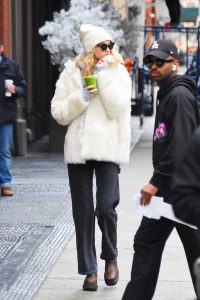 Elsa Hosk in a White Fur Jacket