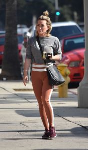 Hilary Duff in an Orange Leggings