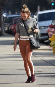 Hilary Duff in an Orange Leggings