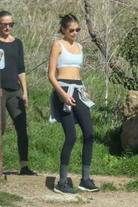 Kaia Gerber in a Gray Sports Bra