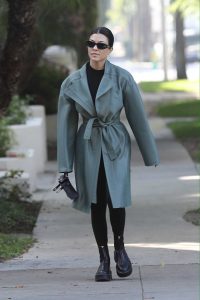 Kourtney Kardashian in a Green - Gray Leather Trench Coat