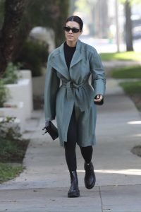 Kourtney Kardashian in a Green - Gray Leather Trench Coat