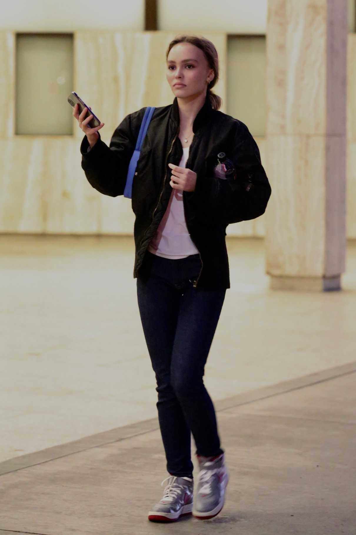 Lily-Rose Depp in a Black Bomber Jacket
