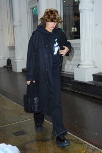 Bella Hadid in a Black Trench Coat