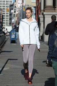 Karlie Kloss in a White Adidas Jogging Jacket