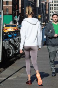 Karlie Kloss in a White Adidas Jogging Jacket