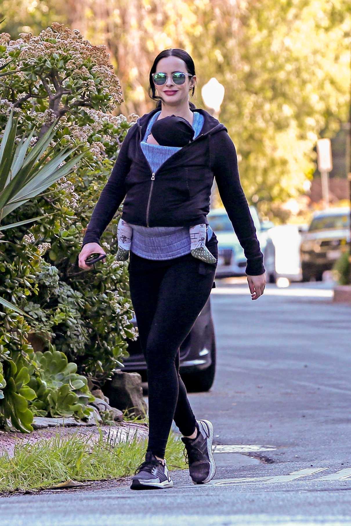 Krysten Ritter in a Black Leggings