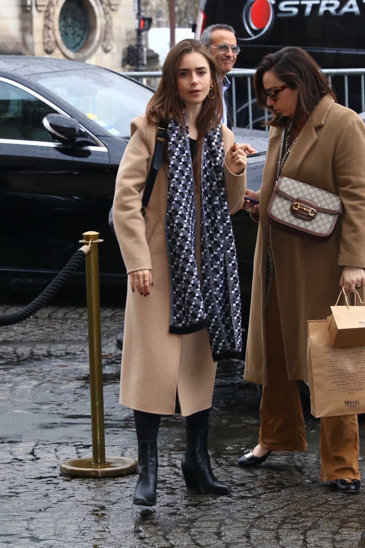 Lily Collins in a Tan Coat