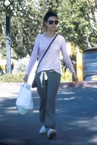 Mila Kunis in a White Striped Long Sleeves T-Shirt