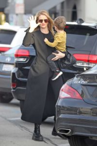 Rosie Huntington-Whiteley in a Black Coat