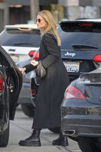 Rosie Huntington-Whiteley in a Black Coat