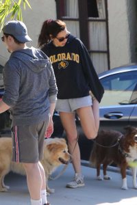 Aubrey Plaza in a Gray Sneakers
