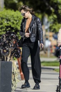 Dakota Johnson in a Black Leather Jacket