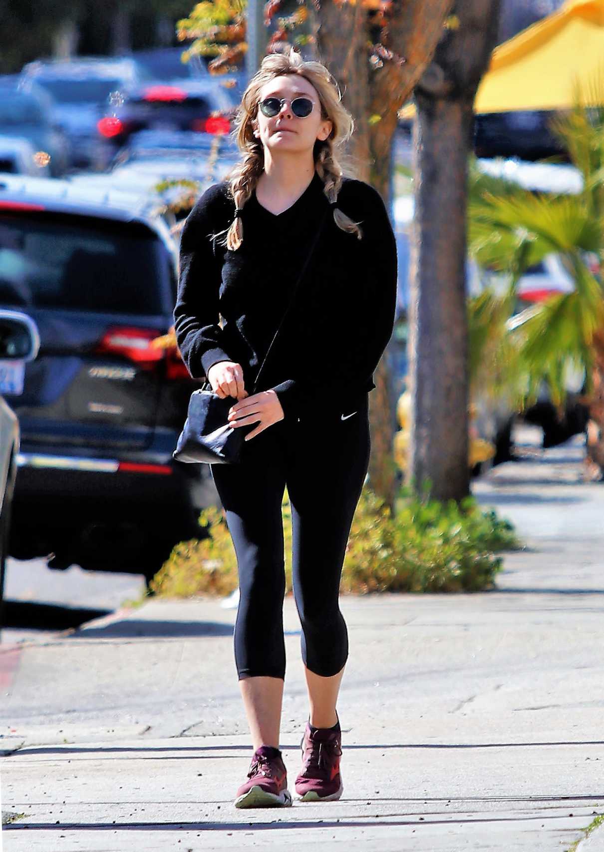 Elizabeth Olsen in a Black Leggings