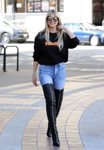 Heidi Klum in a Black Sweatshirt