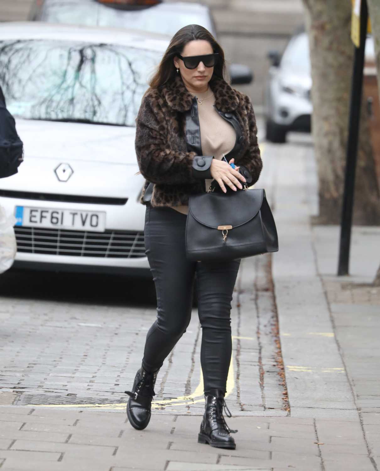 Kelly Brook in a Black Boots