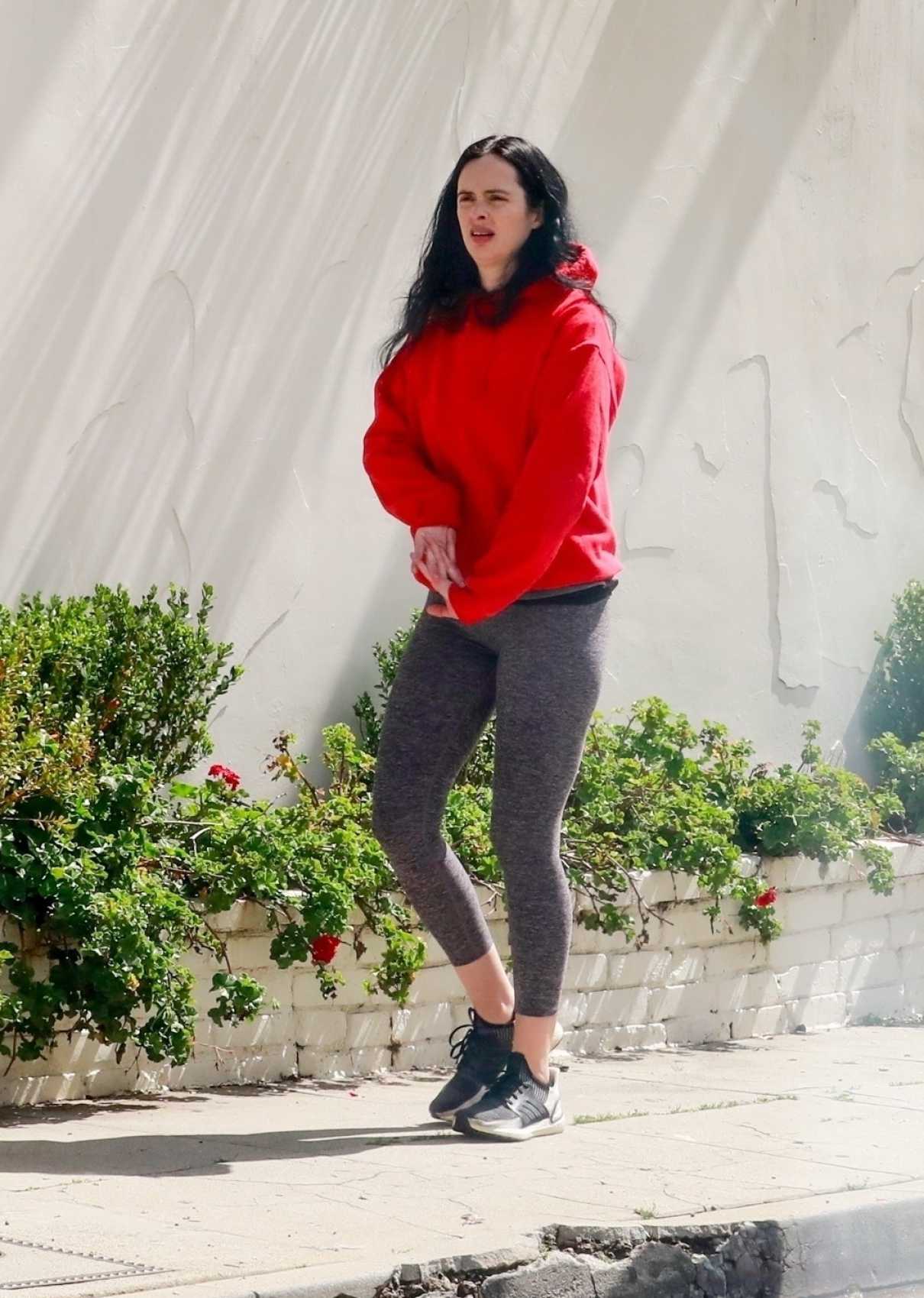 Krysten Ritter in a Red Hoody