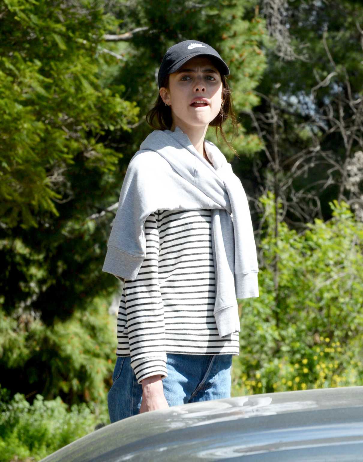 Margaret Qualley in a Black Cap