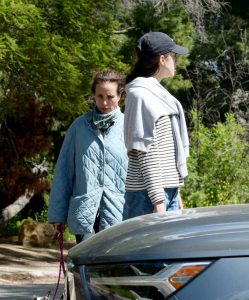 Margaret Qualley in a Black Cap