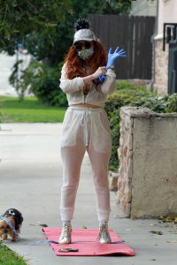 Phoebe Price in a Surgical Face Mask