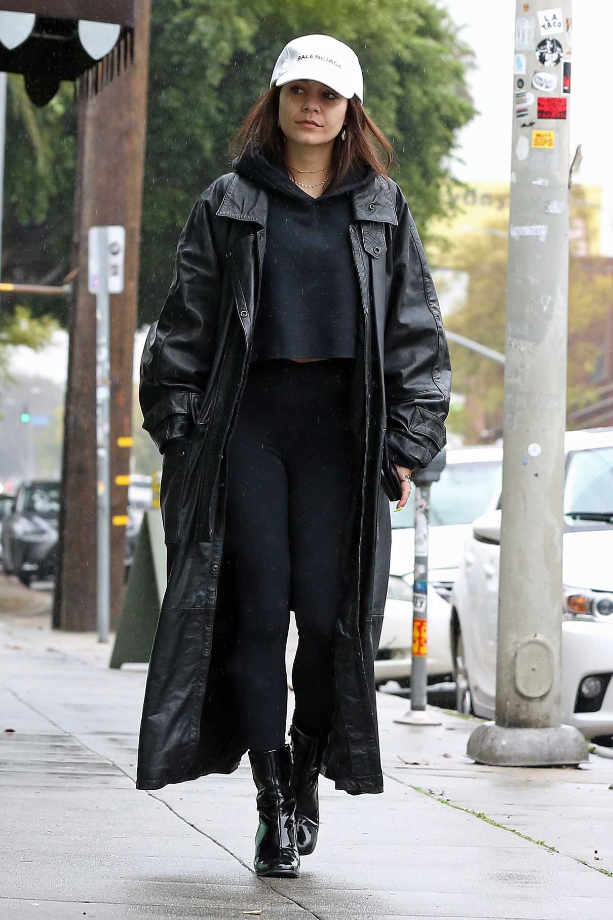 Vanessa Hudgens in a Black Leather Coat Braves the Rain in Los Angeles