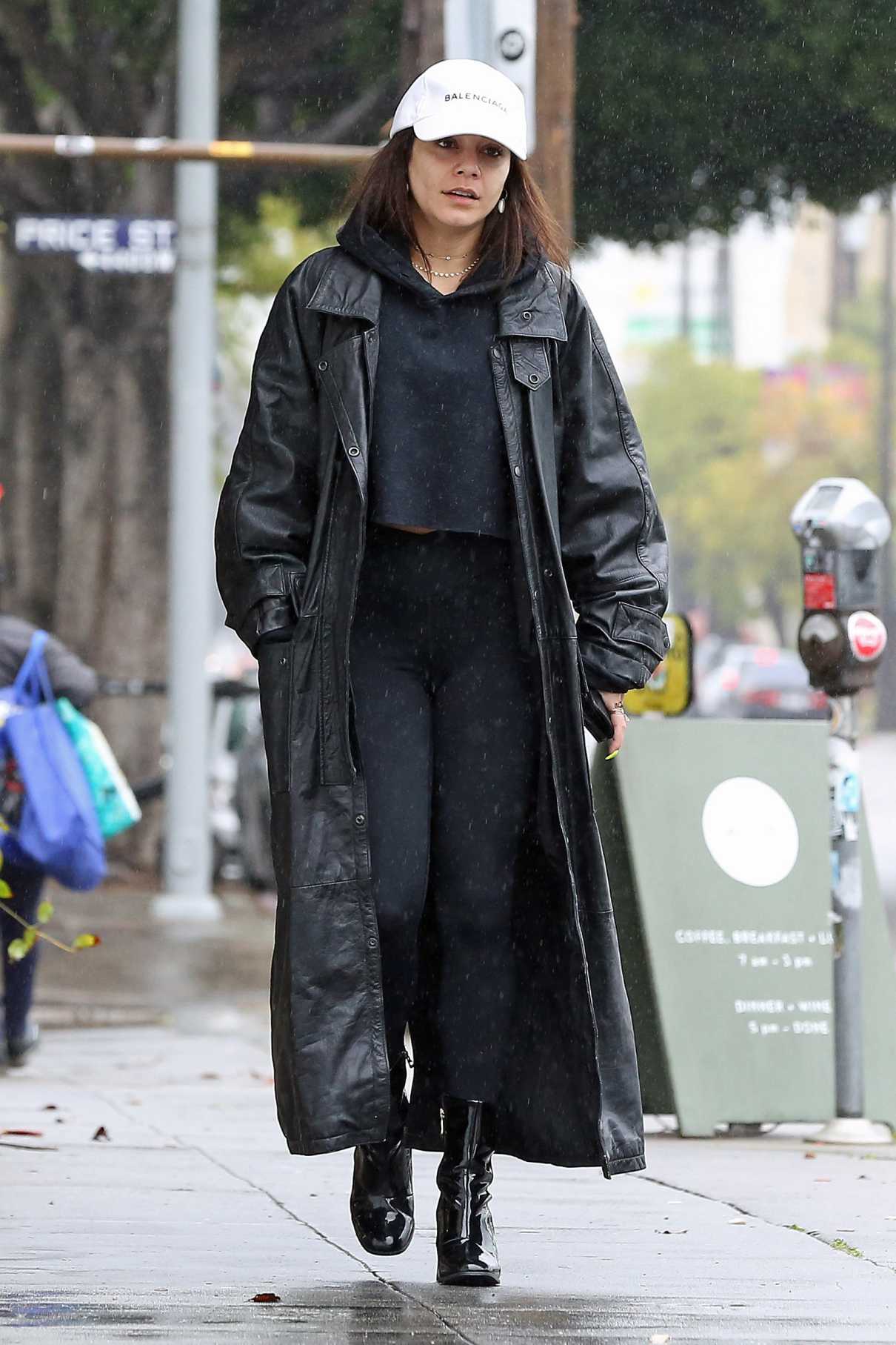 Vanessa Hudgens in a Black Leather Coat Braves the Rain in Los Angeles ...