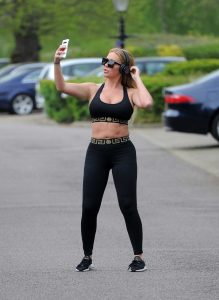 Aisleyne Horgan-Wallace in a Black Sports Bra