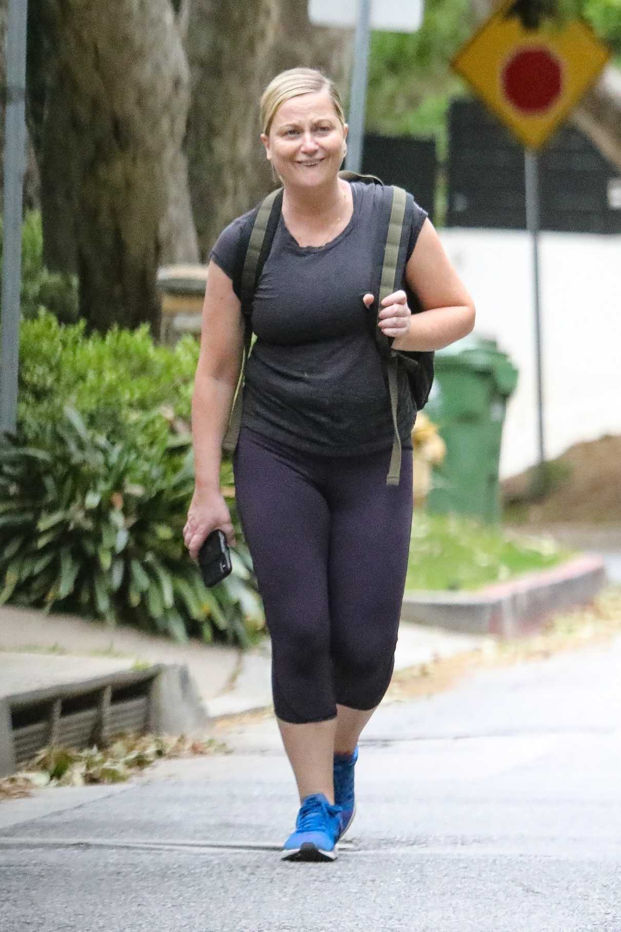 Amy Poehler in a Blue Sneakers