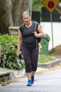 Amy Poehler in a Blue Sneakers