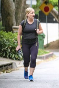 Amy Poehler in a Blue Sneakers