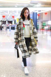 Janine Chang in a Plaid Coat