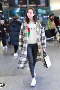 Janine Chang in a Plaid Coat