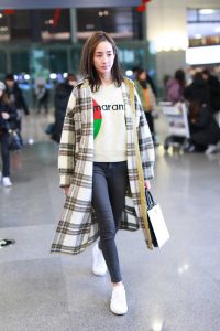 Janine Chang in a Plaid Coat