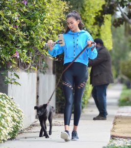 Kelly Gale in a Neon Blue Hoody