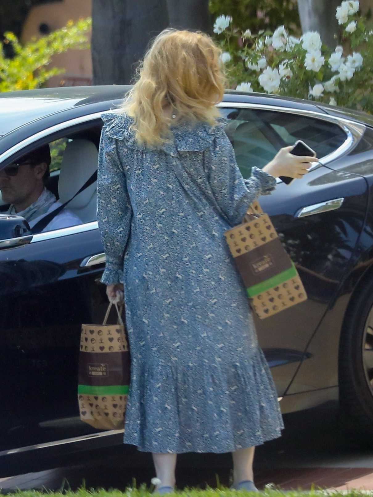 Kimberly Brook in a Blue Dress Returns After Picking up Food at ...