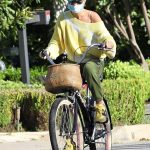 Laeticia Hallyday in a Blue Cap Does an Afternoon Bike Ride in Brentwood 04/17/2020