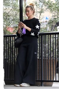 Margot Robbie in a Black Adidas Track Pants