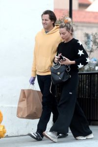 Margot Robbie in a Black Adidas Track Pants