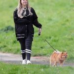 Molly Smith in a White Sneakers Walks Her Dog Close to Her Home in Manchester 04/18/2020