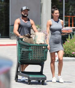 Oksana Rykova in a Short Gray Dress