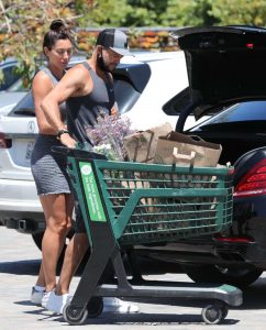 Oksana Rykova in a Short Gray Dress