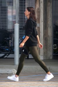 Oksana Rykova in a White Nike Sneakers