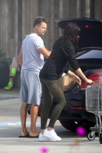 Oksana Rykova in a White Nike Sneakers