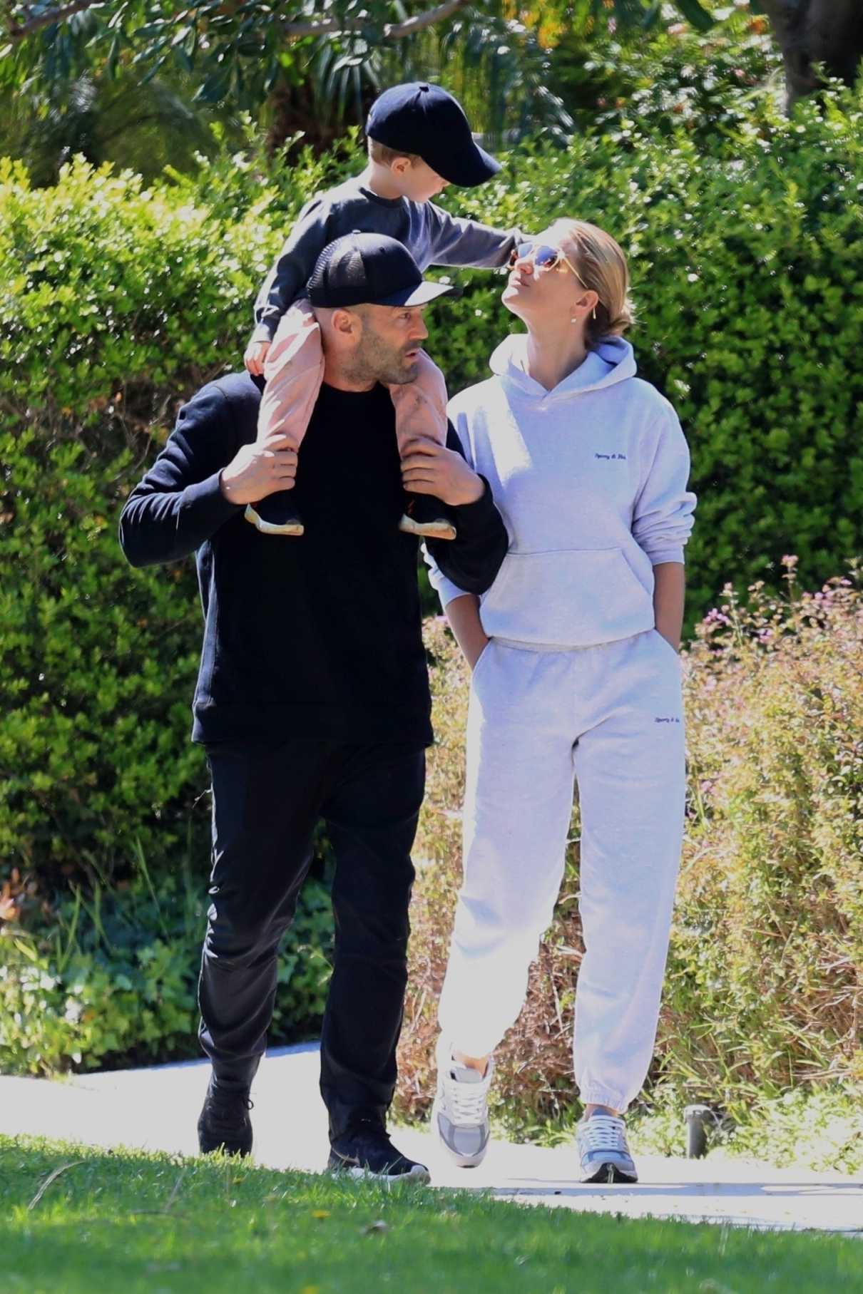 Rosie Huntington-Whiteley in a White Sweatsuit Was Seen Out with Jason