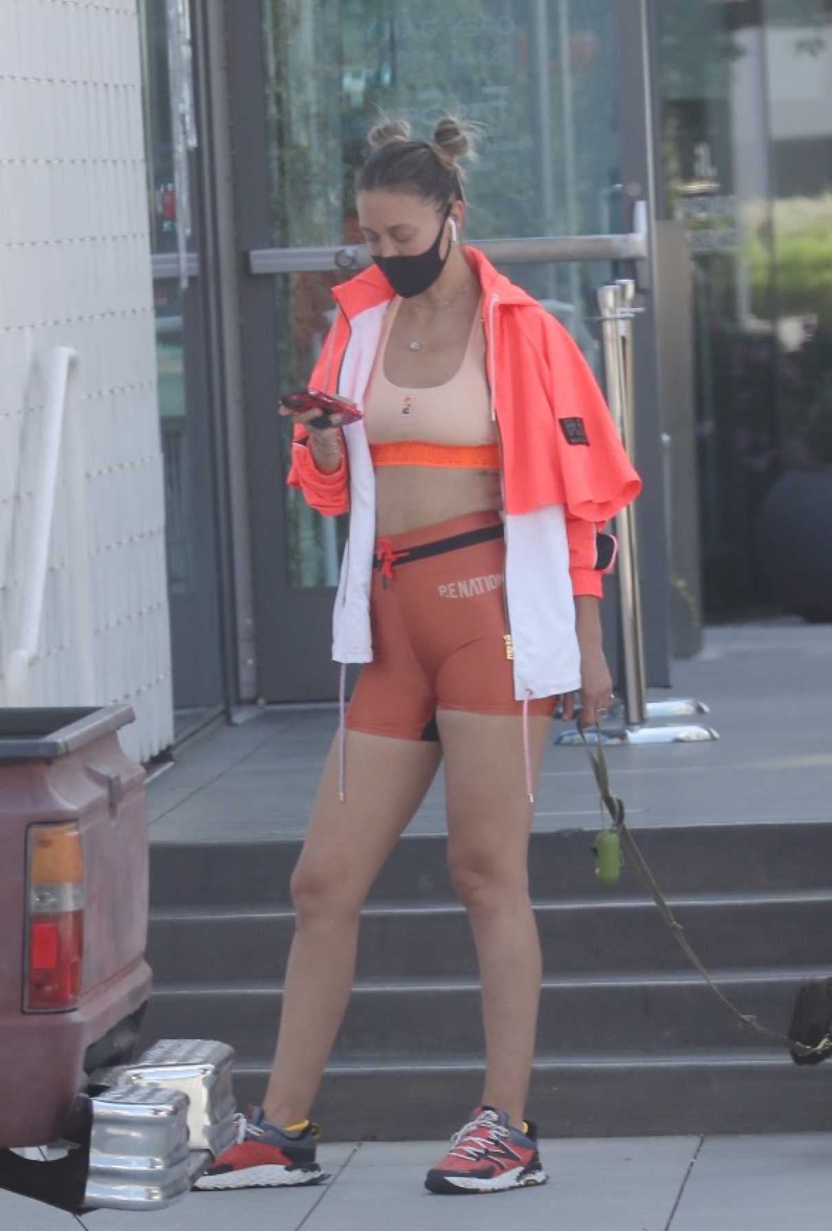 Alana Hadid in a Black Protective Mask