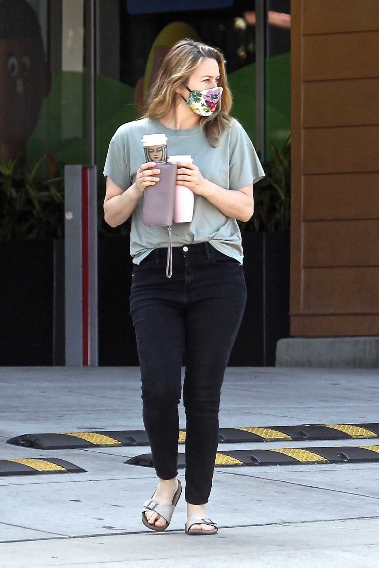 Alicia Silverstone in a Face Mask Makes a Pit Stop at a Local Starbucks