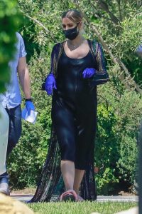 Ashlee Simpson in a Black Protective Mask