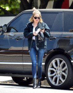 Ashley Benson in a Black Boots