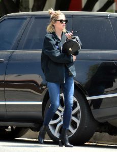 Ashley Benson in a Black Boots