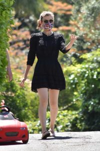 Kate Mara in a Short Black Dress